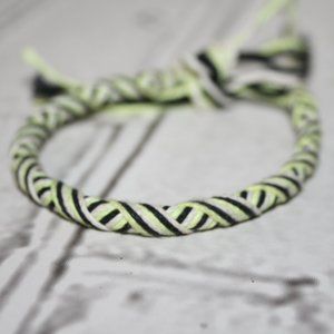 Neon yellow, white and black friendship bracelet adjustable